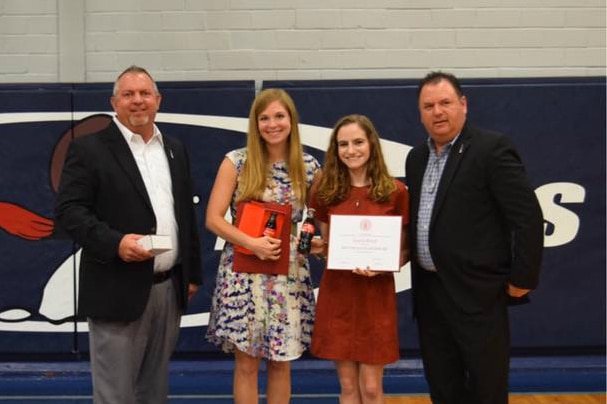 Educator of Distinction Emily Vigen with Lucia Boyd (2017) and her local Coca-Cola bottlers at Loyola College Prep in Shreveport, LA.