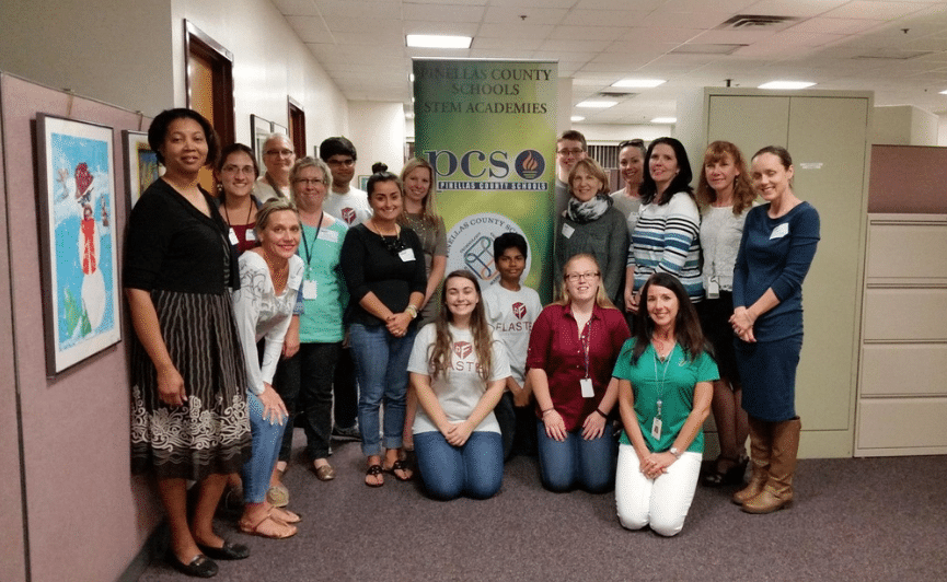 Adriana (bottom center) empowers youth through FLASTEM.